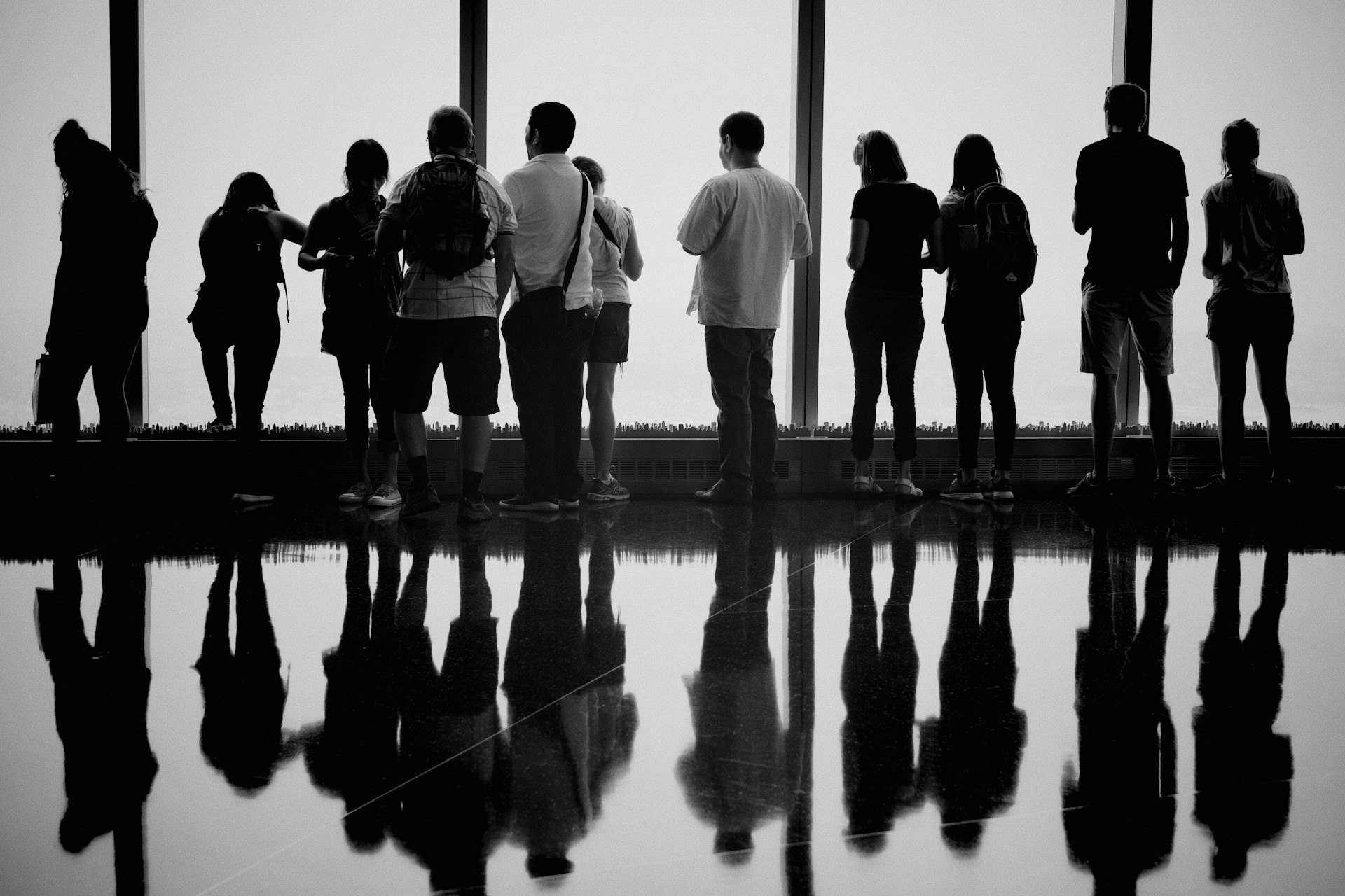 people standing on a building